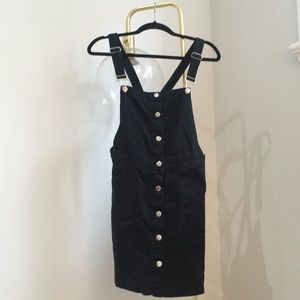 Black overall dress with buttons